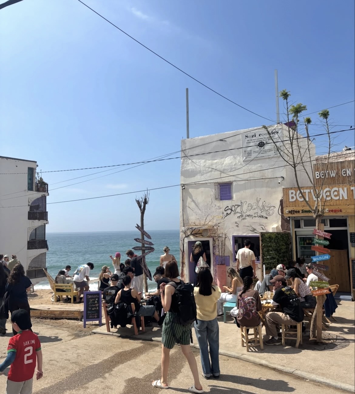 The Sozi Cookies shop and its busy outdoor seating overlooking the Atlantic Ocean